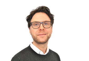 Mitarbeiterfoto von Simons Alexander. 
